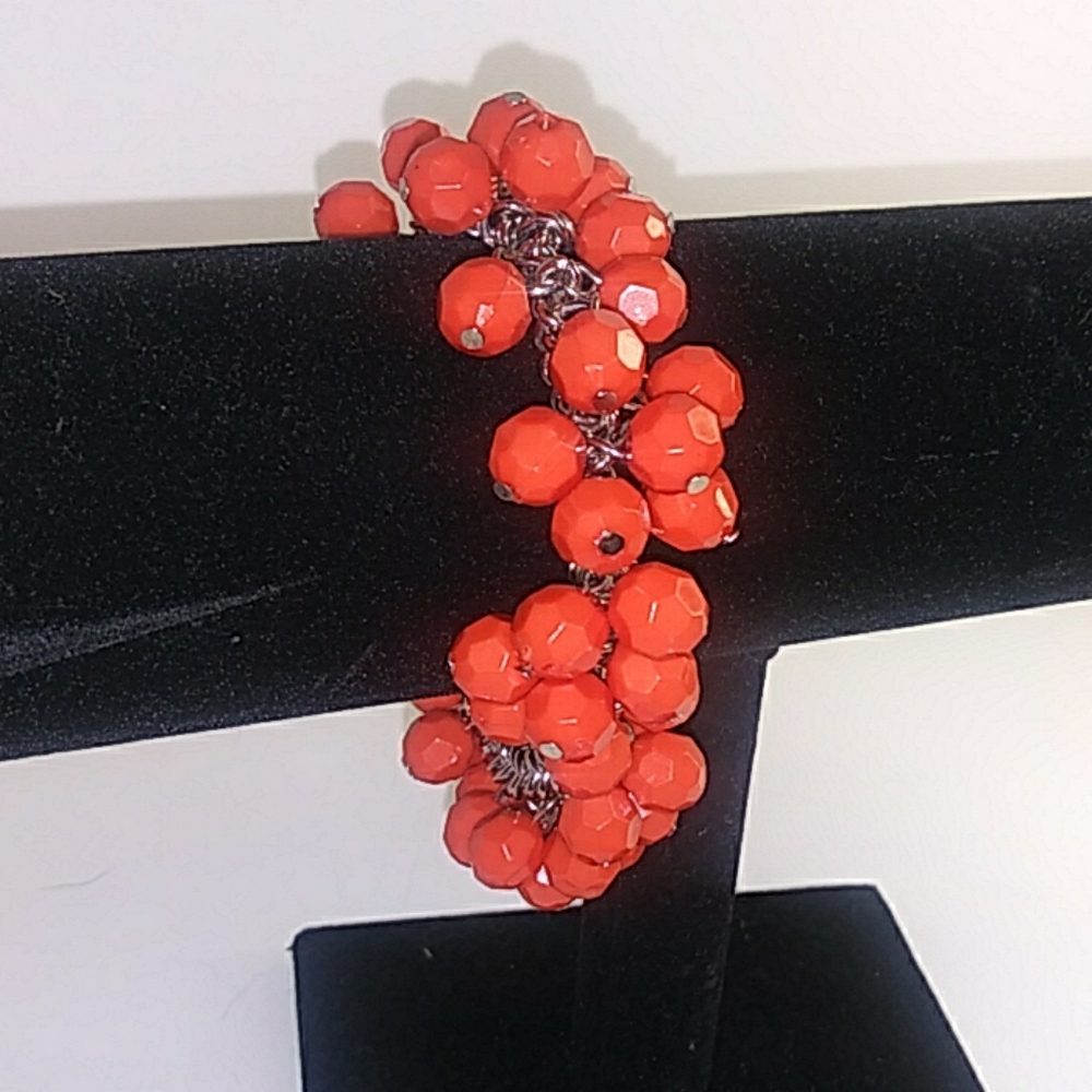 Tangerine beaded stretch bracelet on silver chain